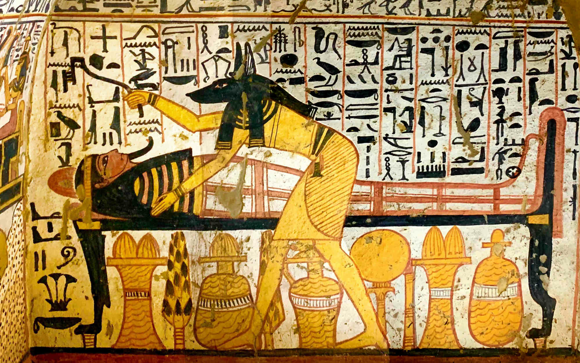 Anubis, the jackal-headed God who presides over the Opening of the Mouth and weighs the heart in the Hall of Two Truths